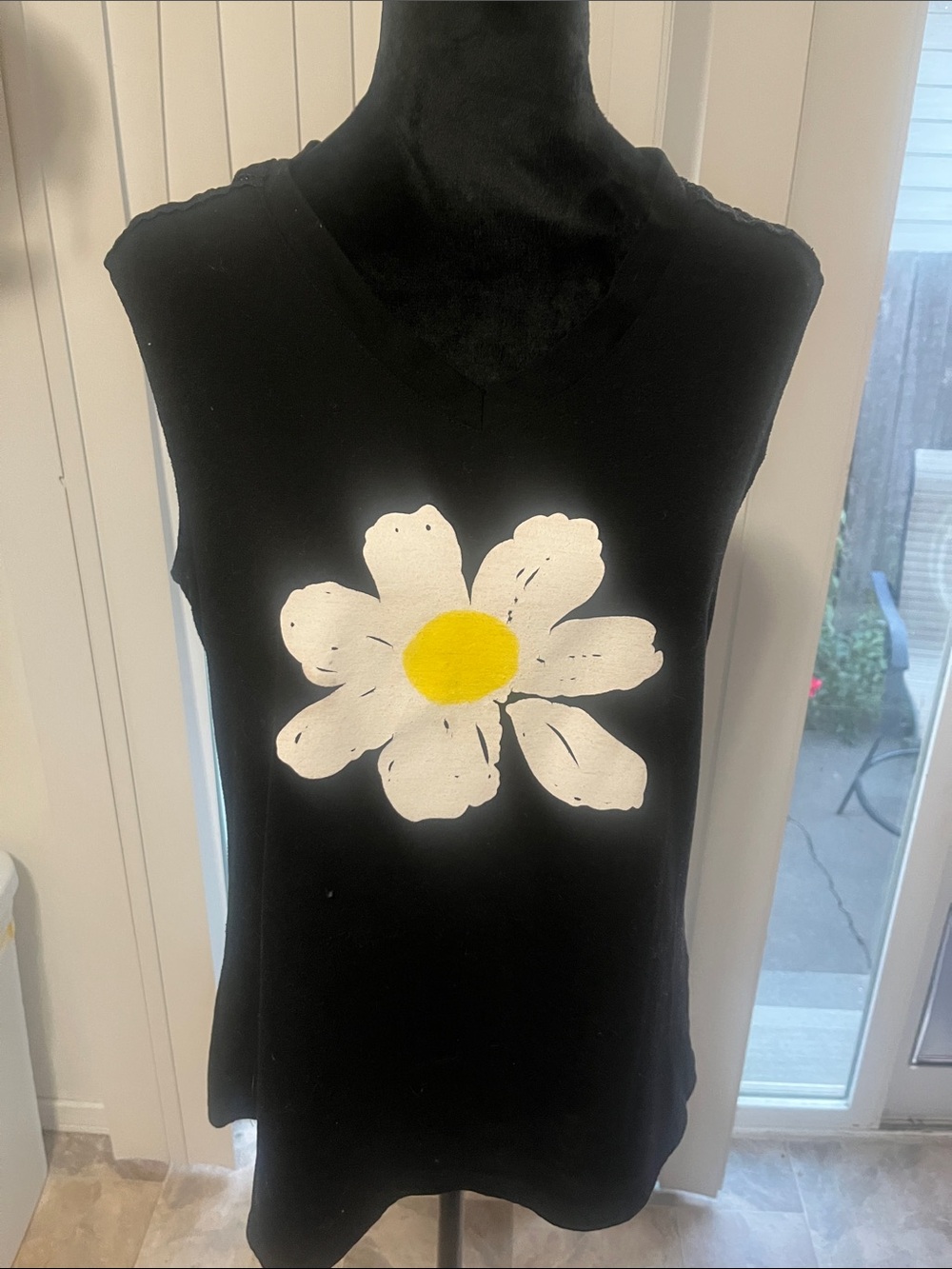 Women’s Black Sleeveless Top with White Daisy Graphic